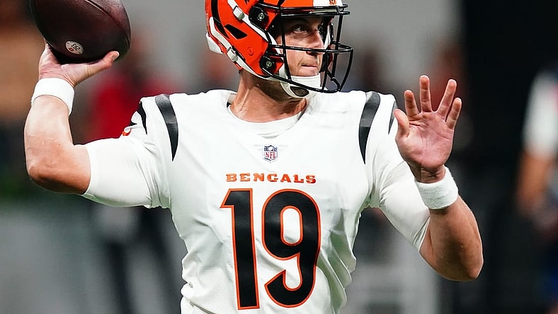 Aug 18, 2023; Atlanta, Georgia, USA; Cincinnati Bengals quarterback Trevor Siemian (19) rolls out to pass against the Atlanta Falcons during the first quarter at Mercedes-Benz Stadium. Mandatory Credit: John David Mercer-USA TODAY Sports
