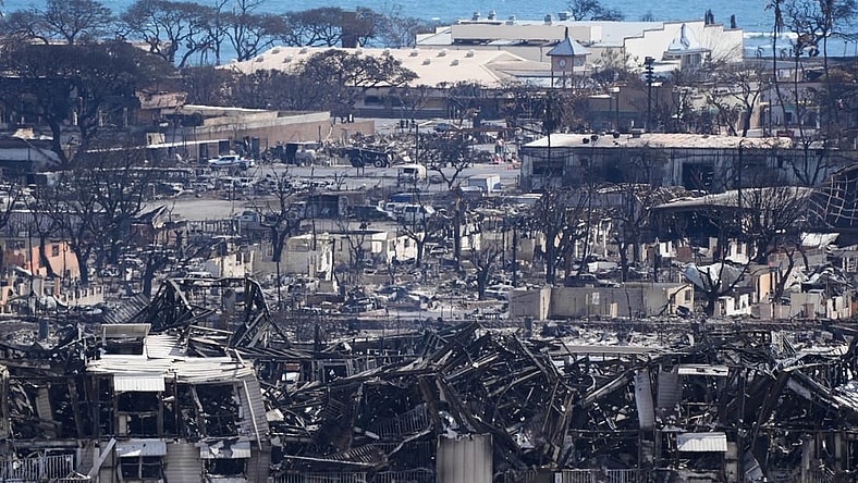 Aug. 12, 2023 : Burned houses and buildings are seen in Lahaina. Thousands were displaced after a wildfire fueled by winds from Hurricane Dora and dry vegetation destroyed much of the town. The death toll from the fire makes it the deadliest wildfire of the past U.S.