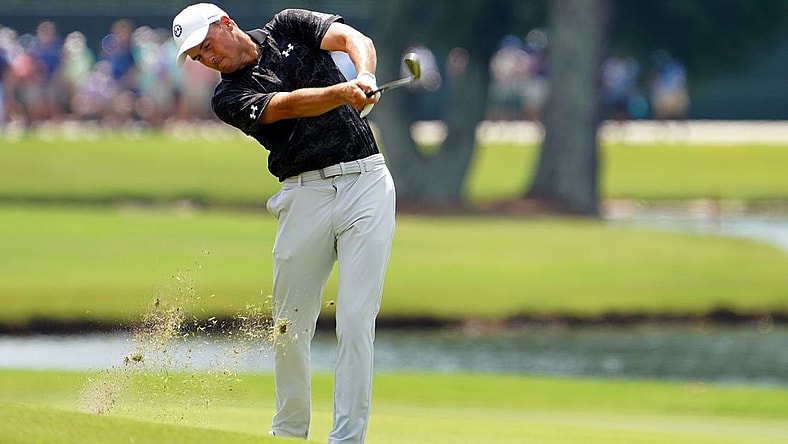 Jordan Spieth plays his shot on the on the eighth hole during the second round of the TOUR Championship golf tournament at East Lake Golf Club. Mandatory Credit: John David Mercer-USA TODAY Sports