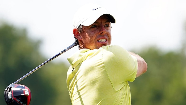 Aug 26, 2023; Atlanta, Georgia, USA; Rory McIlroy plays his shot from the fourth tee during the third round of the TOUR Championship golf tournament at East Lake Golf Club. Mandatory Credit: John David Mercer-USA TODAY Sports