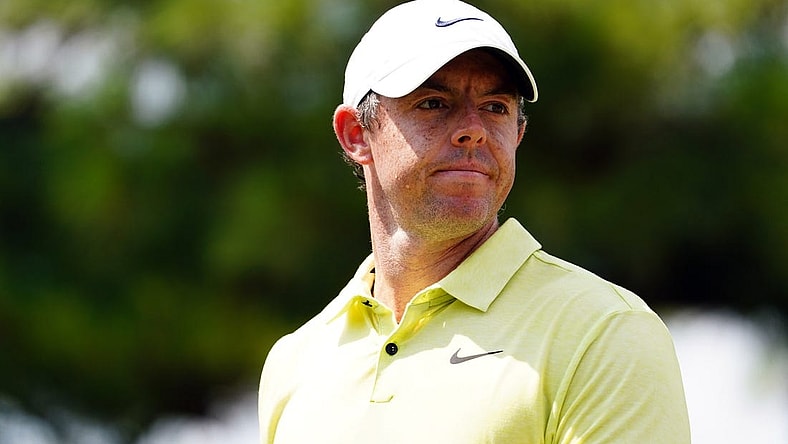 Aug 26, 2023; Atlanta, Georgia, USA; Rory McIlroy reacts to his putt on the third green during the third round of the TOUR Championship golf tournament at East Lake Golf Club. Mandatory Credit: John David Mercer-USA TODAY Sports