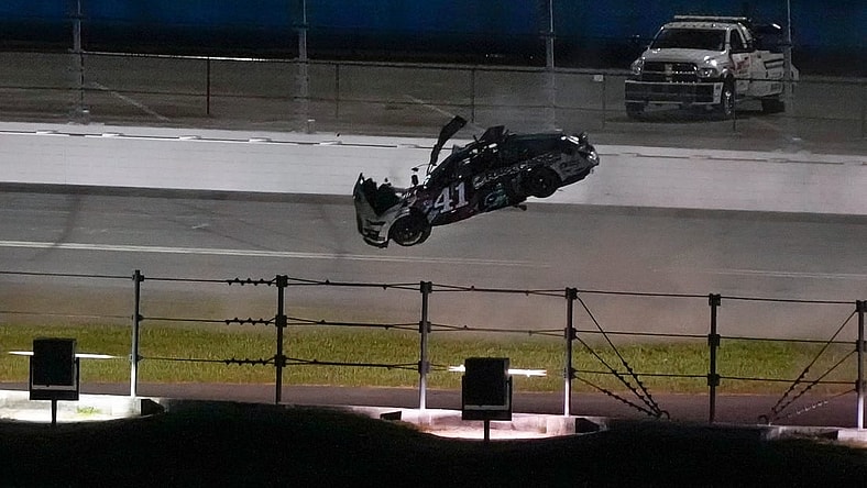 Ryan Preece flips multiple times during the runing of the Coke Zero Sugar 400 at Daytona International Speedway, Saturday, Aug. 26, 2023.
