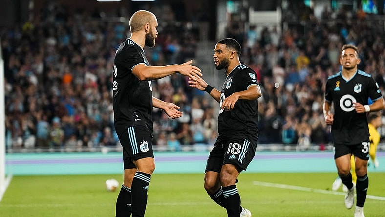 Aug 30, 2023; Saint Paul, Minnesota, USA; Minnesota United forward Teemu Pukki (22) celebrates a goal with forward Ismael Tajouri-Shradi (18) during the first half against Colorado Rapids at Allianz Field. Mandatory Credit: Brace Hemmelgarn-USA TODAY Sports