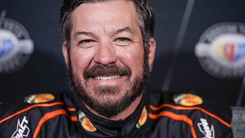 Aug 31, 2023; Charlotte, North Carolina, USA; Martin Truex Jr. answers questions from the media at Charlotte Convention Center. Mandatory Credit: Jim Dedmon-USA TODAY Sports