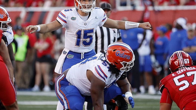 Aug 31, 2023; Salt Lake City, Utah, USA; Florida Gators quarterback Graham Mertz (15) works the line of scrimmage against the Utah Utes at Rice-Eccles Stadium. Mandatory Credit: Jeff Swinger-USA TODAY Sports
