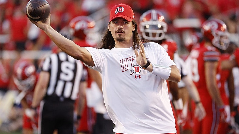 Aug 31, 2023; Salt Lake City, Utah, USA; Utah Utes quarterback Cameron Rising (7), out with an injury warms his quarterback up at halftime against the Florida Gators at Rice-Eccles Stadium. Mandatory Credit: Jeff Swinger-USA TODAY Sports