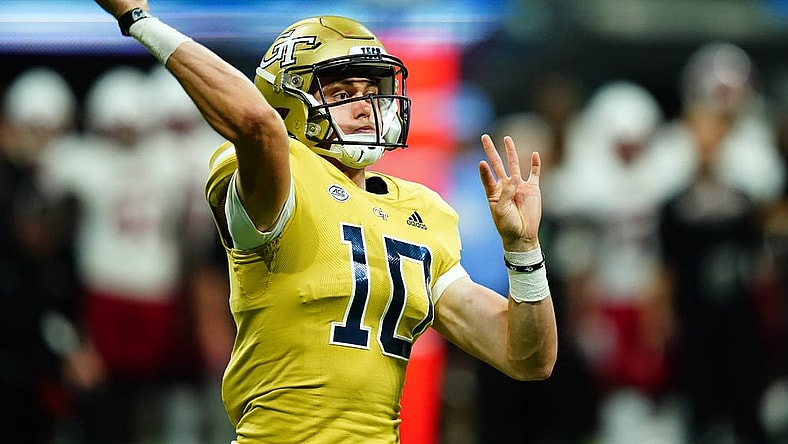 Sep 1, 2023; Atlanta, Georgia, USA; Georgia Tech Yellow Jackets quarterback Haynes King (10) passing against the Louisville Cardinals during the second half at Mercedes-Benz Stadium. Mandatory Credit: John David Mercer-USA TODAY Sports