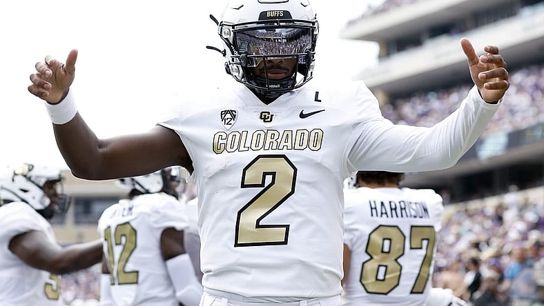 Sep 2, 2023; Fort Worth, Texas, USA; Colorado Buffaloes quarterback Shedeur Sanders (2) celebrates a touchdown in the first quarter against the TCU Horned Frogs at Amon G. Carter Stadium. Mandatory Credit: Tim Heitman-USA TODAY Sports