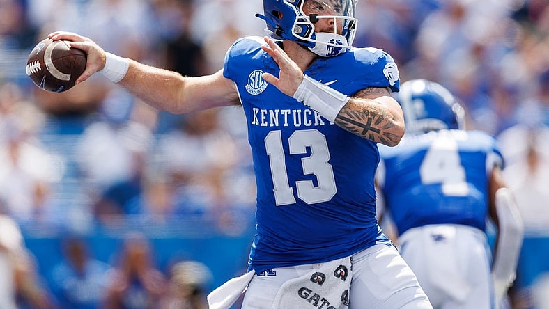 Sep 2, 2023; Lexington, Kentucky, USA; Kentucky Wildcats quarterback Devin Leary (13) throws a pass during the fourth quarter against the Ball State Cardinals at Kroger Field. Mandatory Credit: Jordan Prather-USA TODAY Sports
