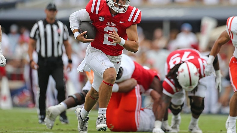 Sep 2, 2023; Oxford, Mississippi, USA; Mississippi Rebels quarterback Jaxson Dart (2) runs the ball during the first half against the Mercer Bears at Vaught-Hemingway Stadium. Mandatory Credit: Petre Thomas-USA TODAY Sports