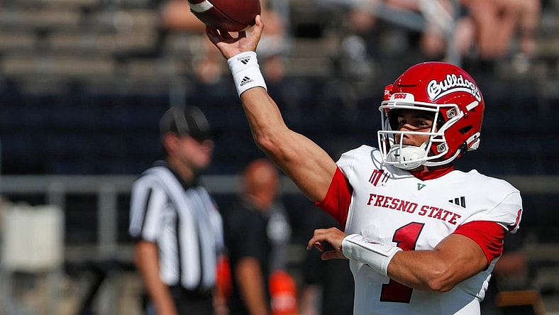 Fresno State Bulldogs quarterback Mikey Keene (1) throws the ball ahead of the NCAA football game against the Purdue Boilermakers, Saturday, Sept. 2, 2023, at Ross-Ade Stadium in West Lafayette, Ind. Fresno State Bulldogs won 39-35.