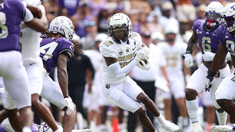 Sep 2, 2023; Fort Worth, Texas, USA; Colorado Buffaloes wide receiver Travis Hunter (12) runs after catching a ball in the first half against the TCU Horned Frogs at Amon G. Carter Stadium. Mandatory Credit: Tim Heitman-USA TODAY Sports