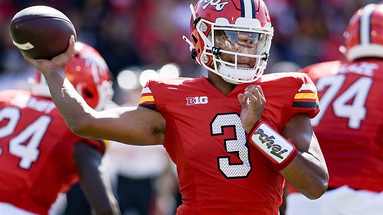 Sep 2, 2023; College Park, Maryland, USA;  Maryland Terrapins quarterback Taulia Tagovailoa (3) looks to throw as the action reflects off his visor during the first half against the Towson Tigers  at SECU Stadium. Mandatory Credit: Tommy Gilligan-USA TODAY Sports