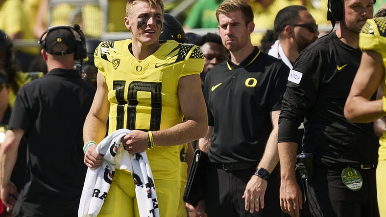 Sep 2, 2023; Eugene, Oregon, USA; Oregon Ducks quarterback Bo Nix (10) watches the game from the sidelines during the second half against the Portland State Vikings at Autzen Stadium. Mandatory Credit: Troy Wayrynen-USA TODAY Sports