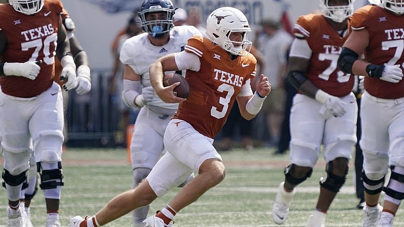 Sep 2, 2023; Austin, Texas, USA; Texas Longhorns quarterback Quinn Ewers (3) keeps the ball for yardage during the first half against the Rice Owls at Darrell K Royal-Texas Memorial Stadium. Mandatory Credit: Scott Wachter-USA TODAY Sports