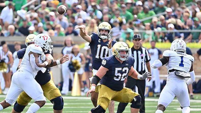 Sep 2, 2023; South Bend, Indiana, USA; Notre Dame Fighting Irish quarterback Sam Hartman (10) throws in the second quarter against the Tennessee State Tigers at Notre Dame Stadium. Mandatory Credit: Matt Cashore-USA TODAY Sports