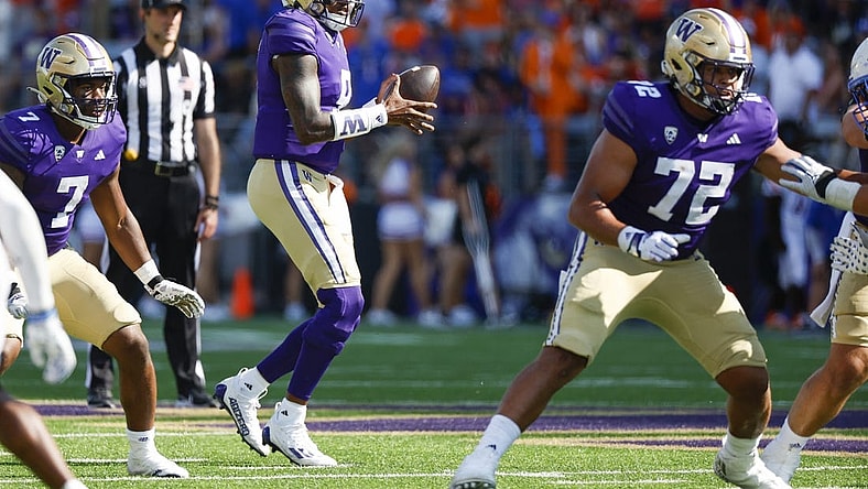Sep 2, 2023; Seattle, Washington, USA; Washington Huskies quarterback Michael Penix Jr. (9) looks to pass against the Boise State Broncos during the fourth quarter at Alaska Airlines Field at Husky Stadium. Mandatory Credit: Joe Nicholson-USA TODAY Sports