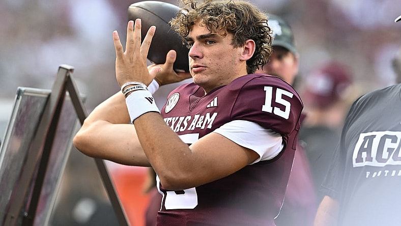 Sep 2, 2023; College Station, Texas, USA; Texas A&M Aggies quarterback Conner Weigman (15) warms up on the sideline during the first quarter against the New Mexico Lobos at Kyle Field. Mandatory Credit: Maria Lysaker-USA TODAY Sports