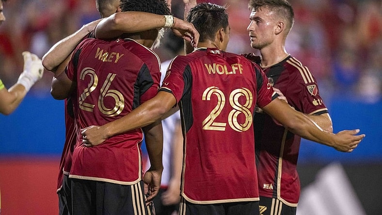 Sep 2, 2023; Frisco, Texas, USA; Atlanta United forward Giorgos Giakoumakis (7) and midfielder Saba Lobjanidze (9) and defender Caleb Wiley (26) and forward Tyler Wolff (28) celebrate after Giakoumakis scores a goal against FC Dallas during the first half at Toyota Stadium. Mandatory Credit: Jerome Miron-USA TODAY Sports