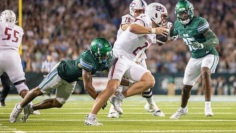 Sep 2, 2023; New Orleans, Louisiana, USA;  South Alabama Jaguars quarterback Carter Bradley (2) scrambles out the pocket to avoid the sack of Tulane Green Wave safety Kam Pedescleaux (8) during the first half at Yulman Stadium. Mandatory Credit: Stephen Lew-USA TODAY Sports