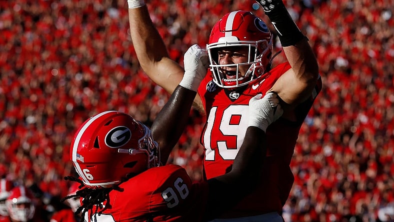 Georgia tight end Brock Bowers (19) celebrates with his teammates after scoring a touchdown during the first half of a NCAA college football game against Tennessee Martin in Athens, Ga., on Saturday, Sept. 2, 2023.