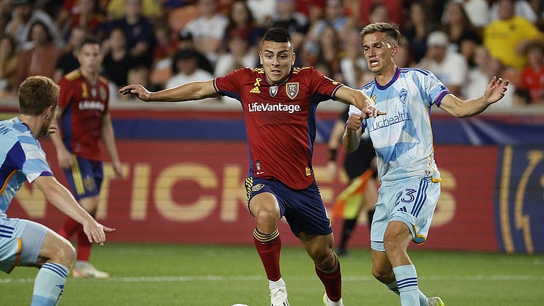 Sep 2, 2023; Sandy, Utah, USA; Real Salt Lake midfielder Braian Ojeda (6) and Colorado Rapids midfielder Cole Bassett (23) battle in the first half at America First Field. Mandatory Credit: Jeff Swinger-USA TODAY Sports