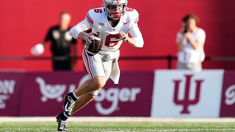 Sep 2, 2023; Bloomington, Indiana, USA; Ohio State Buckeyes quarterback Kyle McCord (6) scrambles during the NCAA football game at Indiana University Memorial Stadium. Ohio State won 23-3.