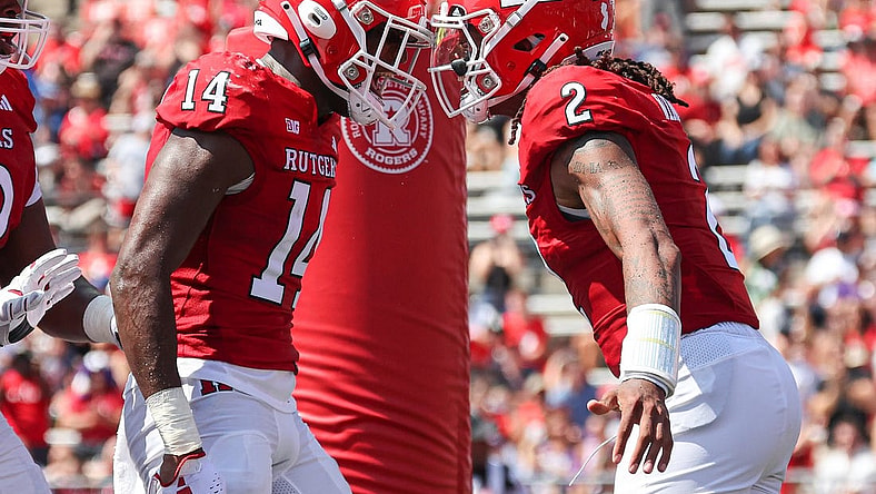 Sep 3, 2023; Piscataway, New Jersey, USA; Rutgers Scarlet Knights quarterback Gavin Wimsatt (2) celebrates his touchdown with wide receiver Isaiah Washington (14) during the first half against the Northwestern Wildcats at SHI Stadium. Mandatory Credit: Vincent Carchietta-USA TODAY Sports