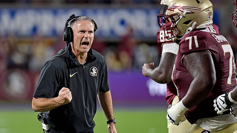 Sep 3, 2023; Orlando, Florida, USA; Florida State Seminoles head coach Mike Norvell is excited during the fourth quarter against the Louisiana State Tigers at Camping World Stadium. Mandatory Credit: Melina Myers-USA TODAY Sports