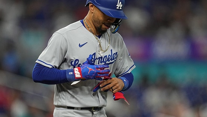 Sep 7, 2023; Miami, Florida, USA; Los Angeles Dodgers right fielder Mookie Betts (50) walks in the first inning against the Miami Marlins at loanDepot Park. Mandatory Credit: Jim Rassol-USA TODAY Sports