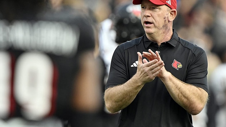 Sep 7, 2023; Louisville, Kentucky, USA; Louisville Cardinals head coach Jeff Brohm watches warmups before facing off against the Murray State Racers at L&N Federal Credit Union Stadium. Mandatory Credit: Jamie Rhodes-USA TODAY Sports