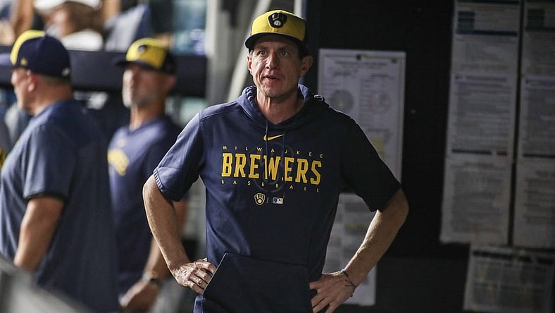 Sep 8, 2023; Bronx, New York, USA;  Milwaukee Brewers manager Craig Counsell (30) looks out from the dugout in the first inning against the New York Yankees at Yankee Stadium. Mandatory Credit: Wendell Cruz-USA TODAY Sports