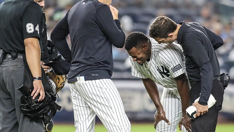 Sep 8, 2023; Bronx, New York, USA;  New York Yankees starting pitcher Luis Severino (40) grimaces after getting injured in the fifth inning against the Milwaukee Brewers at Yankee Stadium. Mandatory Credit: Wendell Cruz-USA TODAY Sports