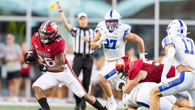 Sep 8, 2023; Bloomington, Indiana, USA; Indiana Hoosiers running back Josh Henderson (26) runs the ball in the first half against the Indiana State Sycamores at Memorial Stadium. Mandatory Credit: Trevor Ruszkowski-USA TODAY Sports