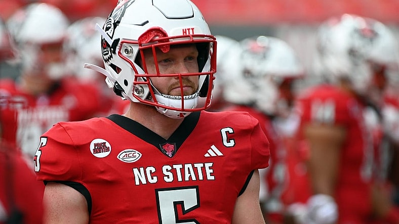 Sep 9, 2023; Raleigh, North Carolina, USA;  North Carolina State Wolfpack quarterback Brennan Armstrong (5) warms up prior to a game against the Notre Dame Fighting Irish at Carter-Finley Stadium. Mandatory Credit: Rob Kinnan-USA TODAY Sports