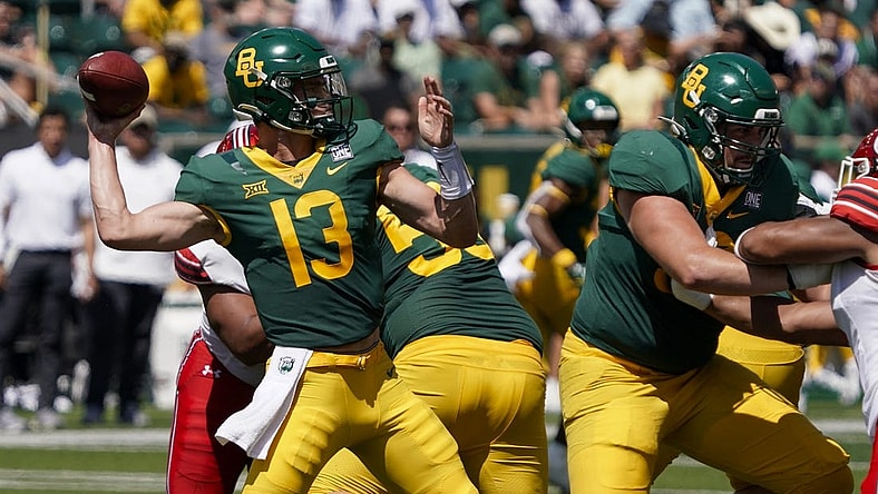 Sep 9, 2023; Waco, Texas, USA; Baylor Bears quarterback Sawyer Robertson (13) throws downfield against the Utah Utes during the first half at McLane Stadium. Mandatory Credit: Raymond Carlin III-USA TODAY Sports