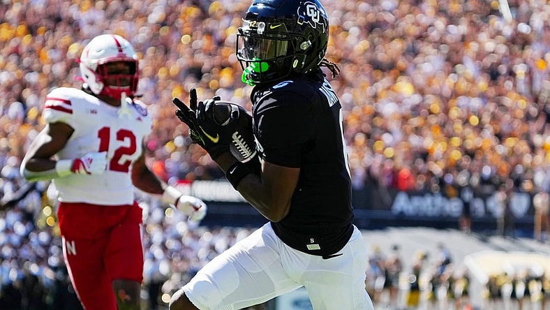 Sep 9, 2023; Boulder, Colorado, USA; Colorado Buffaloes wide receiver Tar'Varish Dawson (6) scores a touchdown against the Nebraska Cornhuskers in the second quarter at Folsom Field. Mandatory Credit: Ron Chenoy-USA TODAY Sports