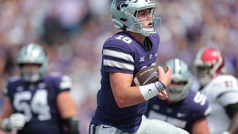 Kansas State senior quarterback Will Howard (18) runs in for a touchdown in the third quarter of Saturday's game against Troy inside Bill Snyder Family Stadium.