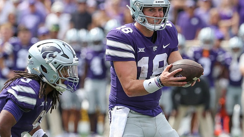 Sep 9, 2023; Manhattan, Kansas, USA; Kansas State Wildcats quarterback Will Howard (18) fakes a handoff to wide receiver RJ Garcia II (3) during the fourth quarter against the Troy Trojans at Bill Snyder Family Football Stadium. Mandatory Credit: Scott Sewell-USA TODAY Sports
