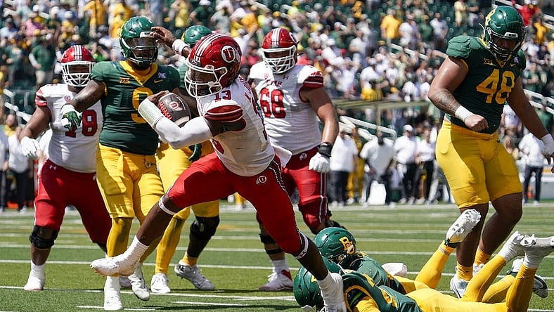 Sep 9, 2023; Waco, Texas, USA; Utah Utes quarterback Nate Johnson (13) carries the ball for a 11-yard touchdown against the Baylor Bears during the second half at McLane Stadium. Mandatory Credit: Raymond Carlin III-USA TODAY Sports