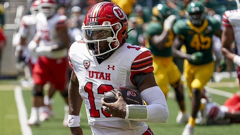 Sep 9, 2023; Waco, Texas, USA; Utah Utes quarterback Nate Johnson (13) carries the ball against the Baylor Bears during the second half at McLane Stadium. Mandatory Credit: Raymond Carlin III-USA TODAY Sports