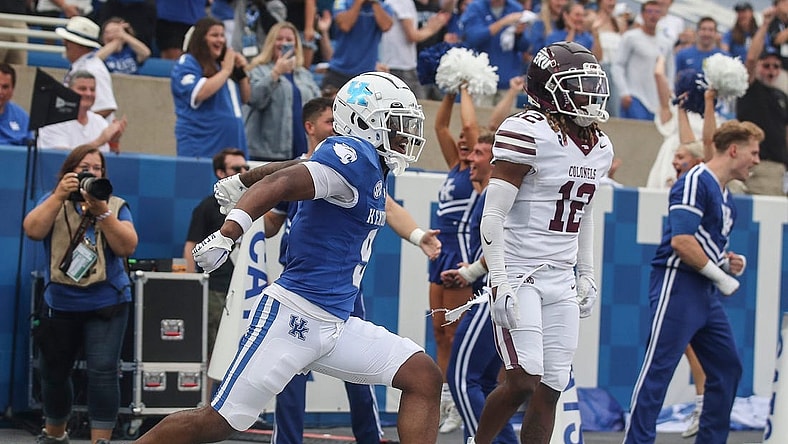 Kentucky Wildcats wide receiver Tayvion Robinson (9) celebrates his touchdown which helped pull the Wildcats even with Eastern Kentucky late in the second quarter Saturday. Sept. 9, 2023.