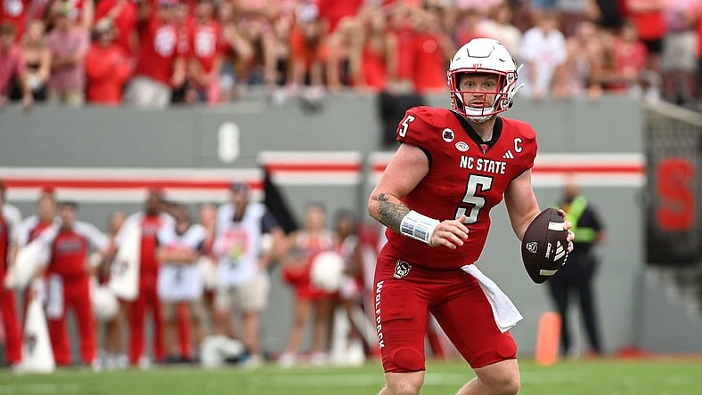 Sep 9, 2023; Raleigh, North Carolina, USA; North Carolina State Wolfpack quarterback Brennan Armstrong (5) looks to pass during the second half against the Notre Dame Fighting Irish at Carter-Finley Stadium. Mandatory Credit: Rob Kinnan-USA TODAY Sports