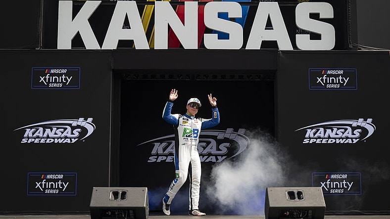 Sep 9, 2023; Kansas City, Kansas, USA; NASCAR Xfinity Series driver John Hunter Nemechek (20) is introduced before the Xfinity Series Kansas Lottery 300 at Kansas Speedway. Mandatory Credit: Amy Kontras-USA TODAY Sports
