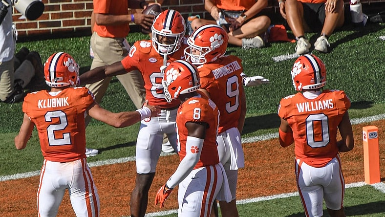 Sep 9, 2023; Clemson, South Carolina, USA; Clemson wide receiver Beaux Collins (80) celebrates with quarterback Cade Klubnik (2) and teammates after his touchdown during the third quarter at Memorial Stadium. Mandatory Credit: Ken Ruinard-USA TODAY Sports