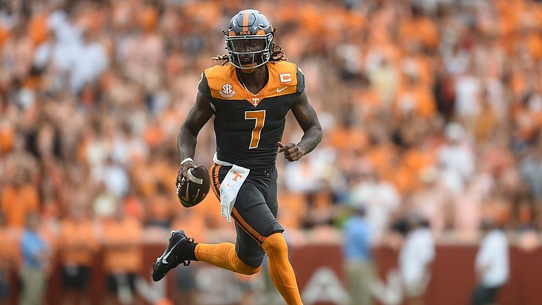 Tennessee quarterback Joe Milton III (7) runs the ball against visiting Austin Peay at Neyland Stadium in Knoxville, Tenn., on Saturday, Sept. 9, 2023.