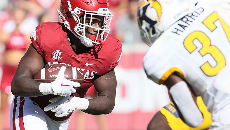 Sep 9, 2023; Fayetteville, Arkansas, USA; Arkansas Razorbacks running back Rashod Dubinion (7) rushes in the third quarter against the Kent State Golden Flashes at Donald W. Reynolds Razorback Stadium. Arkansas won 28-6. Mandatory Credit: Nelson Chenault-USA TODAY Sports