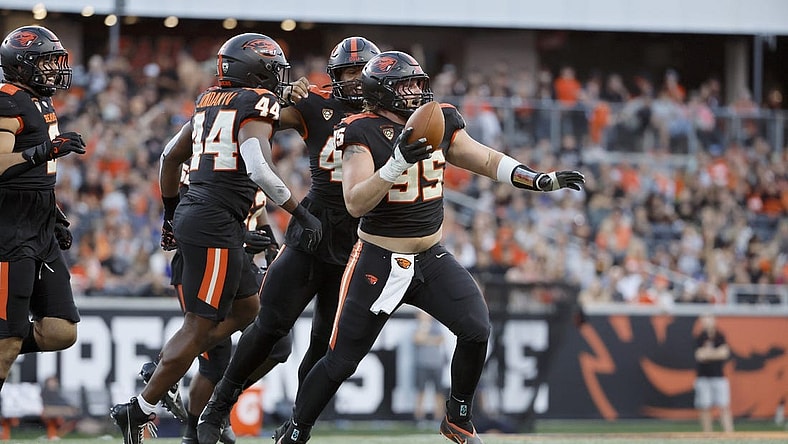 Sep 9, 2023; Corvallis, Oregon, USA; Oregon State Beavers defensive lineman Isaac Hodgins (99) celebrates after recovering a fumble against the UC Davis Aggies during the first half at Reser Stadium. Mandatory Credit: Soobum Im-USA TODAY Sports