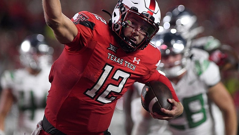 Texas Tech's quarterback Tyler Shough (12) scores a touchdown against Oregon in a non-conference football game, Saturday, Sept. 9, 2023, at Jones AT&T Stadium.