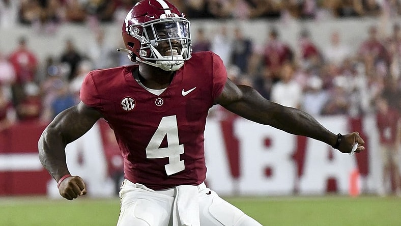 Sep 9, 2023; Tuscaloosa, Alabama, USA;  Alabama Crimson Tide quarterback Jalen Milroe (4) celebrates after hitting Alabama Crimson Tide wide receiver Jermaine Burton (3) for a touchdown at Bryant-Denny Stadium. Texas defeated Alabama 34-24. Mandatory Credit: Gary Cosby Jr. -USA TODAY Sports